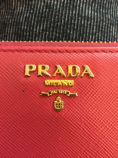 real or fake prada wallet|prada purse fake.